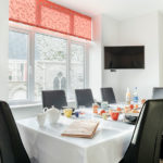 Dining space for 8 in open plan kitchen at 3 The Elms St Ives