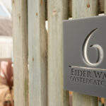 Oystercatcher sign on gate. No. 6.