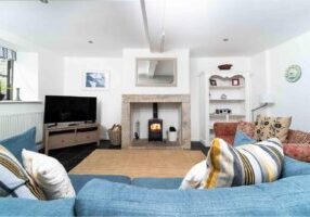 Quicks Cottage Living Room With Woodburner